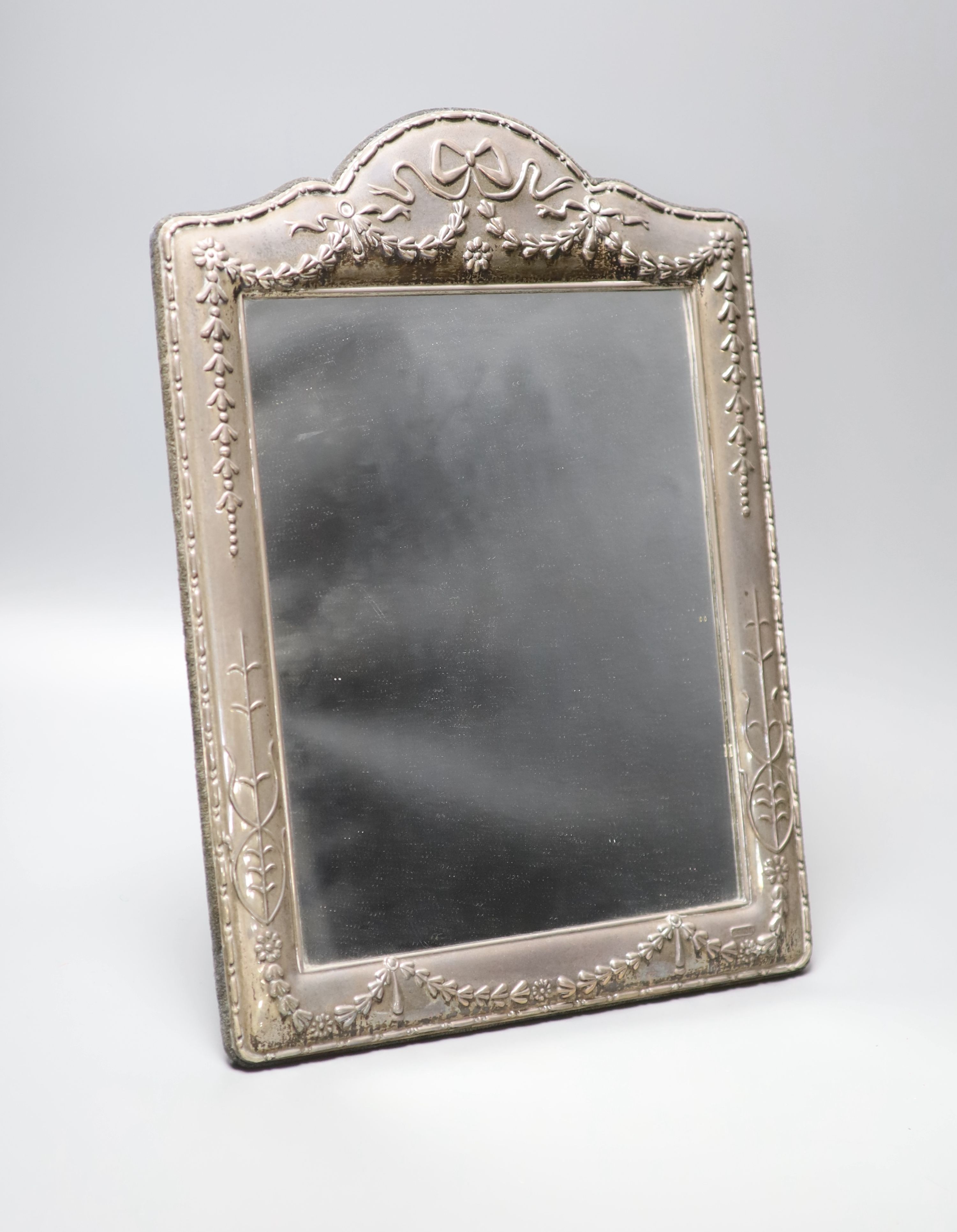 A modern repousse silver mounted easel mirror, Carrs of Sheffield, Sheffield, 1996, 36.1cm.